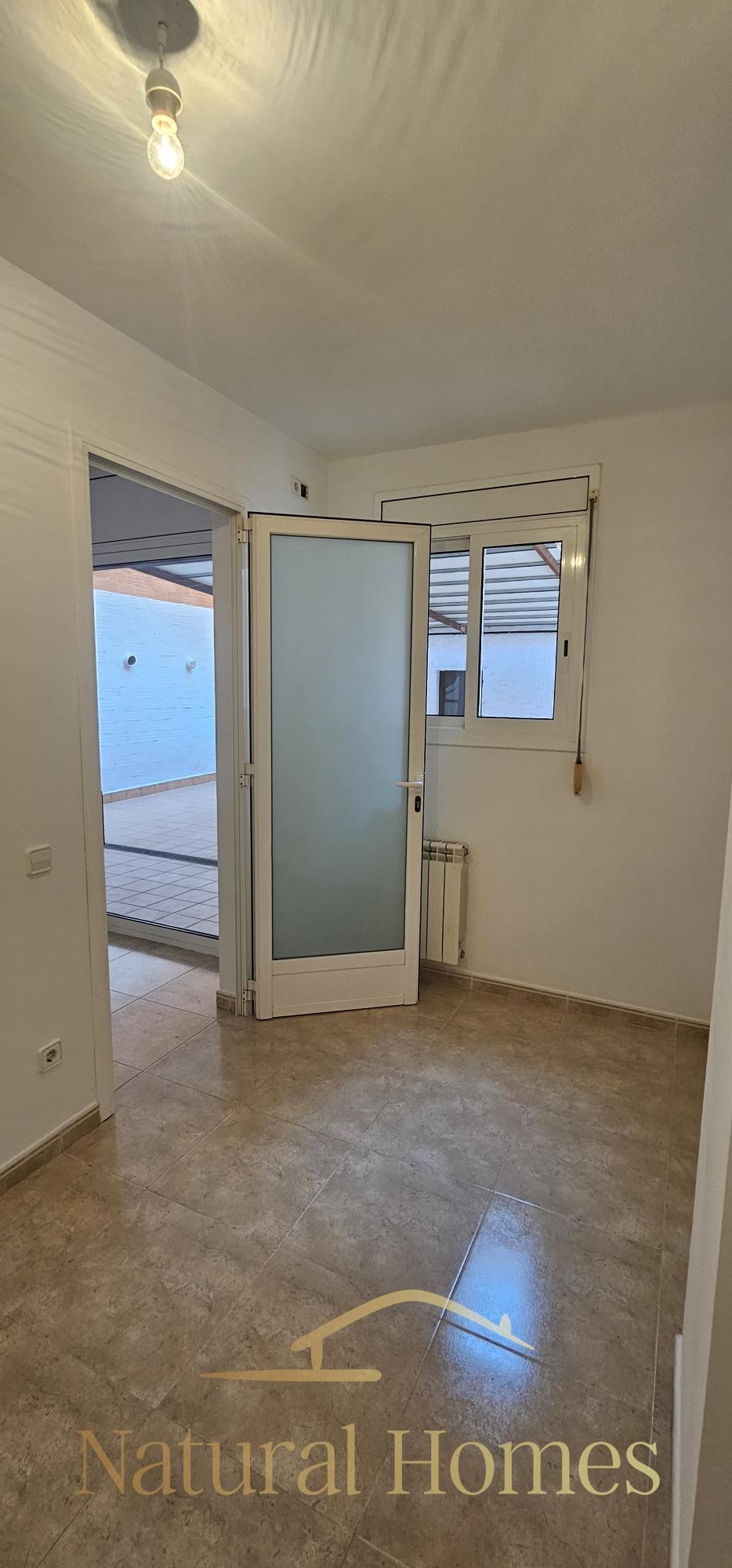habitación individual Cómoda Planta baja con patio privado en alquiler